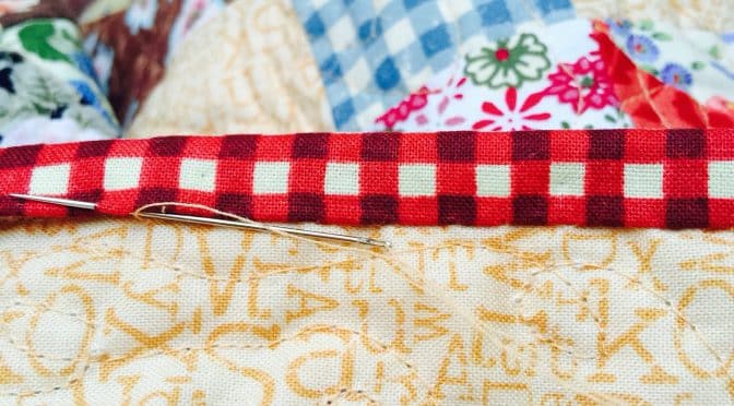 Hand Sewing the Binding on a Quilt Tutorial susies-scraps.com