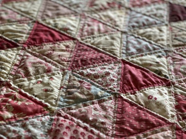 Hand Quilting Scrappy Thousand Pyramids susies-scraps.com